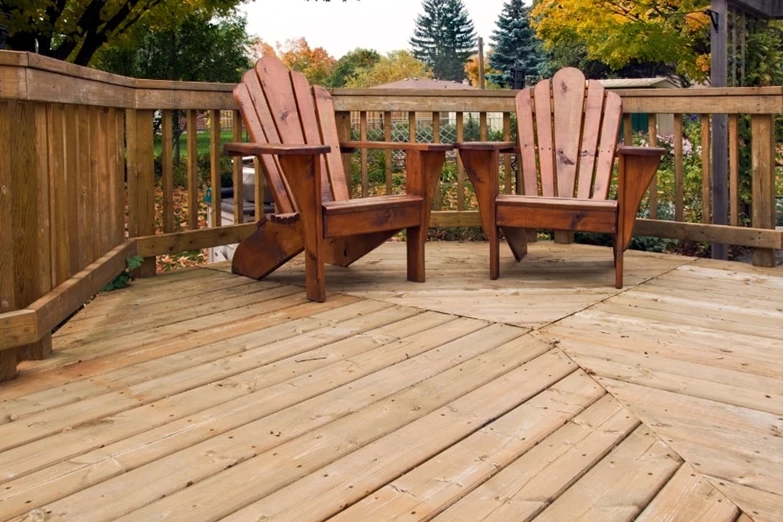 2 chairs on a wood patio