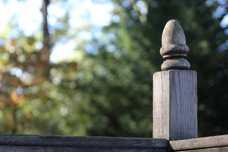 Aged wooden desk post