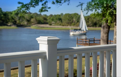 Deck Railing With Lake In The Background