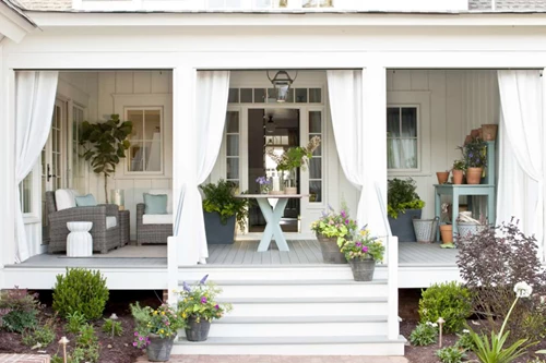 Covered Porch With Curtains