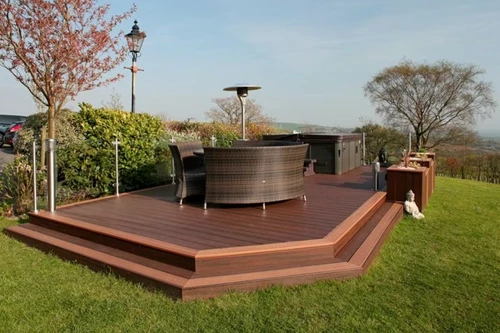 Floating Deck With Hot Tub And Wicker Furniture