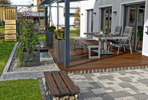 Outdoor patio table under trellis